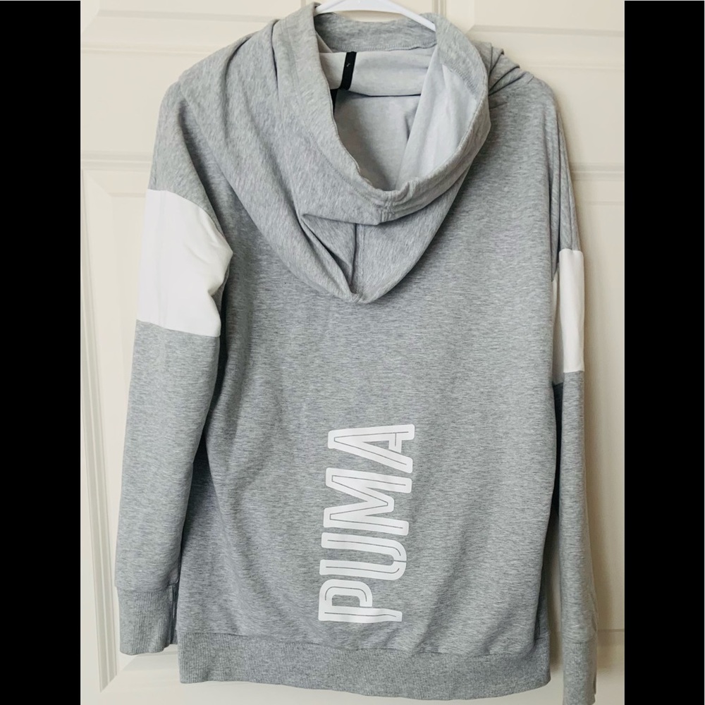 Women’s size Large Puma Sweatshirt.